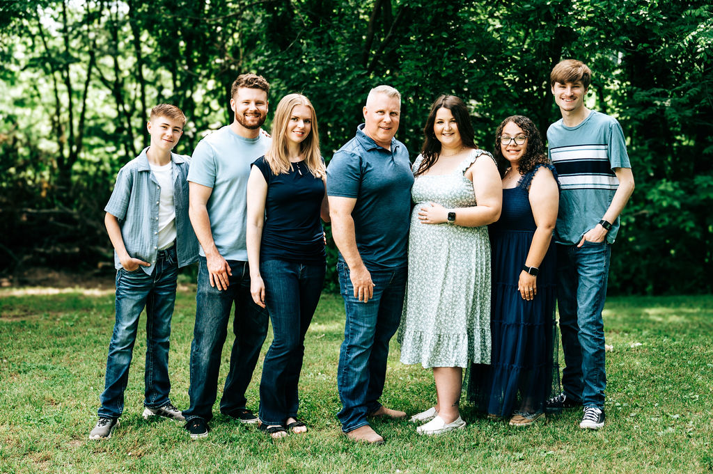 Parents and children posing for family portraits in Mid Missouri