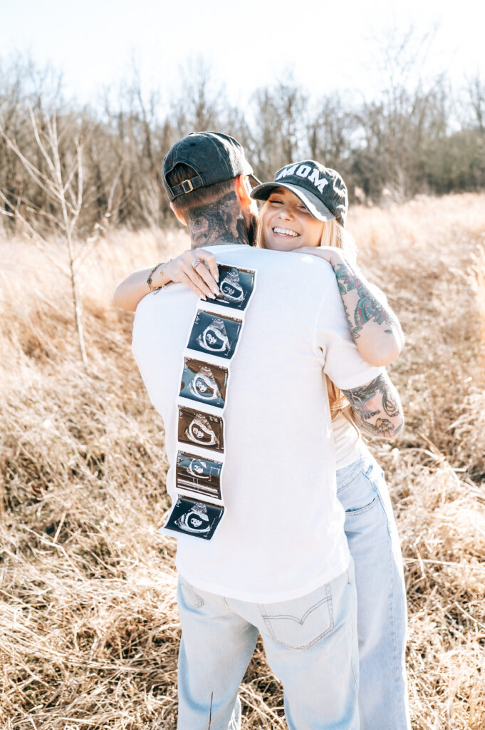 Pregnancy photos in a golden field in Mid Missouri