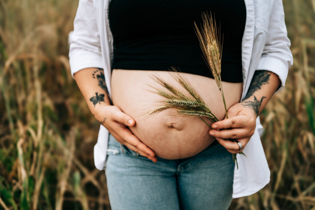 Expecting mom during outdoor maternity photos in Missouri